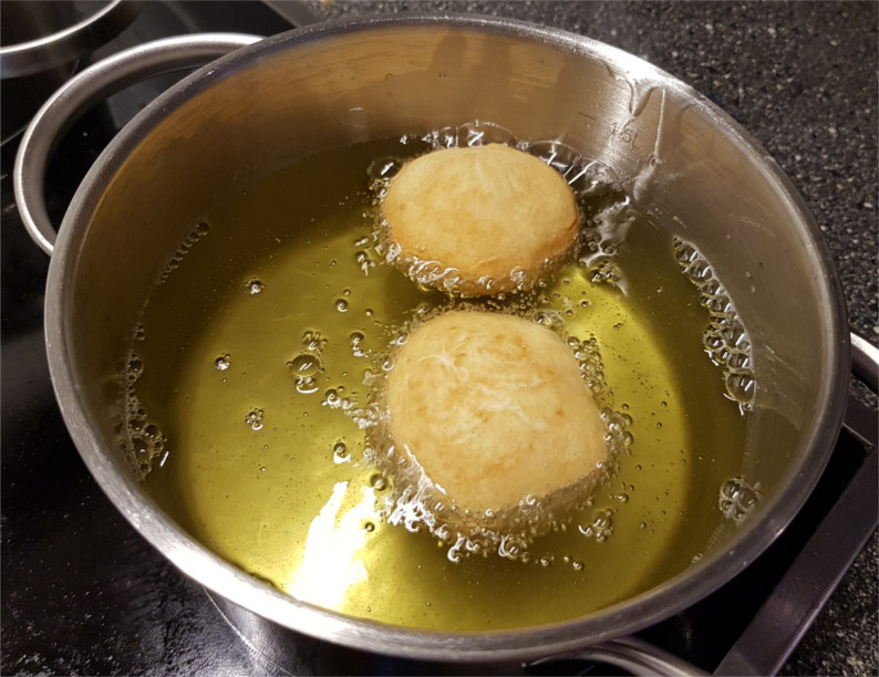 Malasada frittieren Malasada frittieren